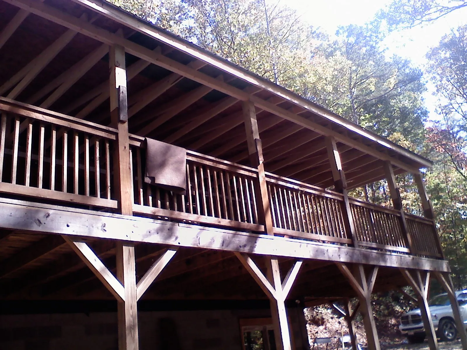 Timber framing under a new elevated porch and deck — Roof Leak Repair in Derwood by Roofing Brothers